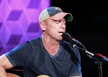 Kenny Chesney has something up his sleeves