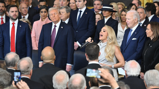 Room joins in as Carrie Underwood sings America the Beautiful at Trump inauguration